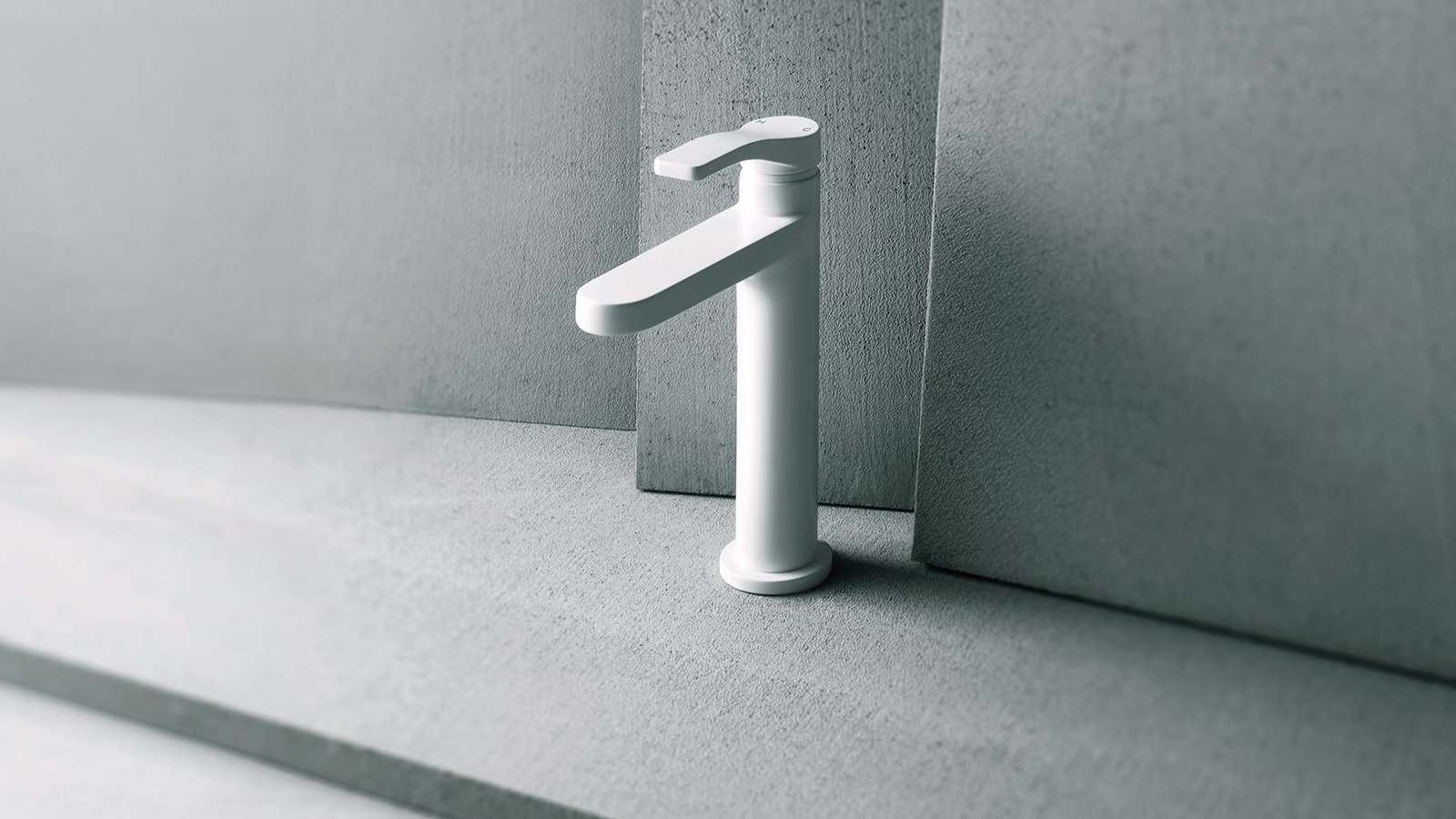 Monomando de lavabo AL/23 de Fantini en cromo ante una losa de hormigón gris