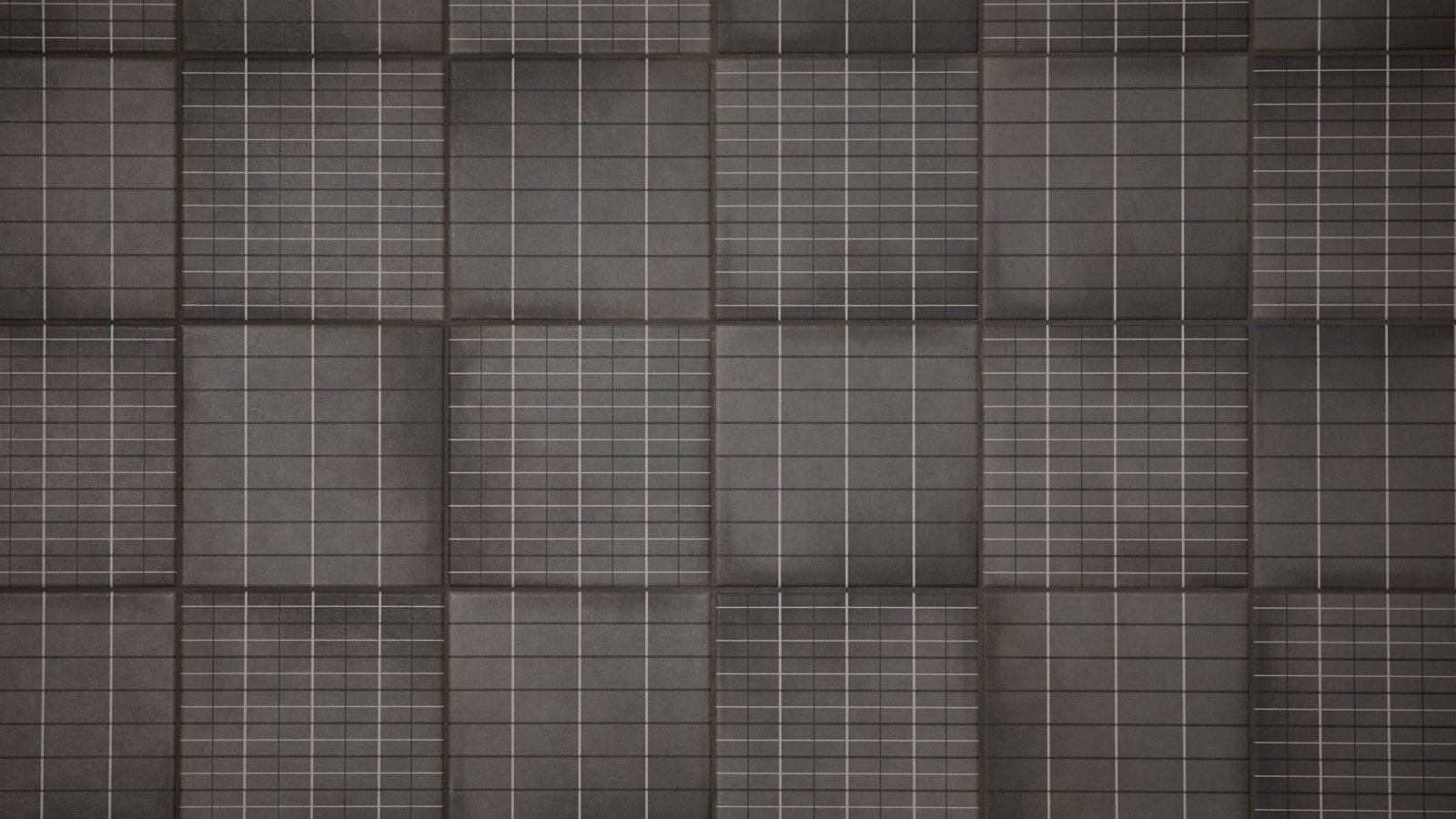 Pared de baño en gres Aurore Charcoal Grid L de Mutina