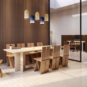 Mesa redonda Ginza de Codutti de 120 cm y 70 de altura con tres butacas en un rincón de conversación