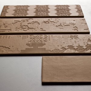 Baño de dirección revestido con Bas-Relief de Urquiola
