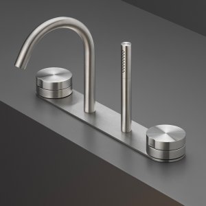 Giotto de Cea Design: monomando de pared sobre lavabo de piedra