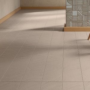 Pared de ducha revestida con Otto de Mutina Latte
