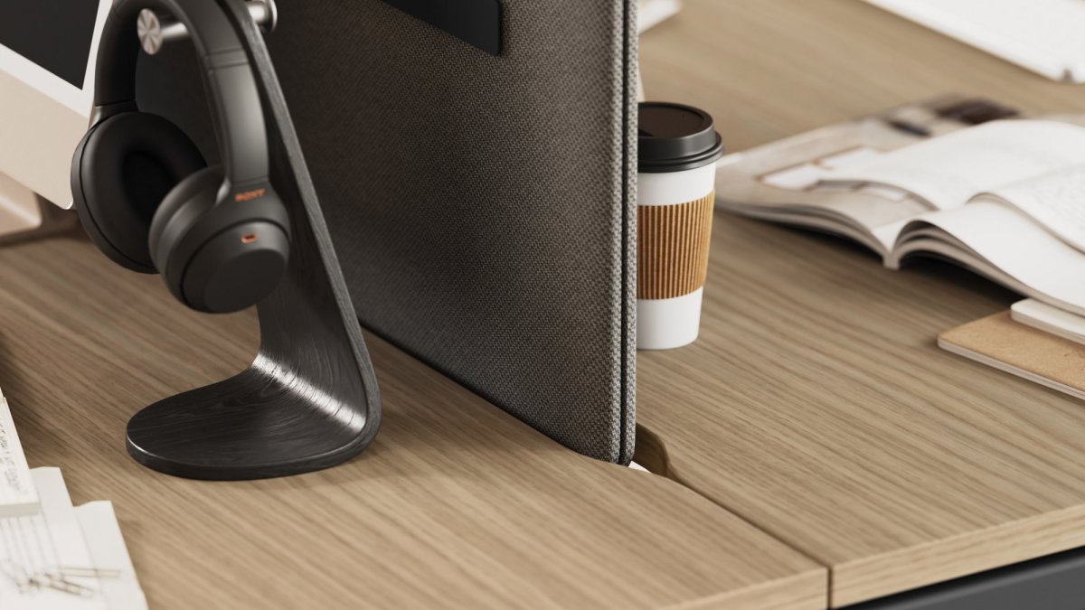 Detalle del puesto Sigma de Las Mobili: sobre efecto madera y panel separador de tela