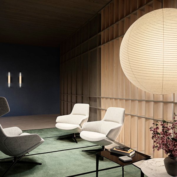 Lounge de empresa con butacas y asientos de diseño Arper